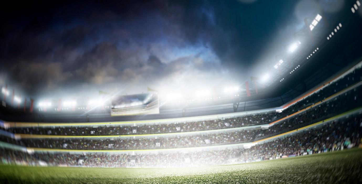 A stadium with lights and smokeAI-generated content may be incorrect.